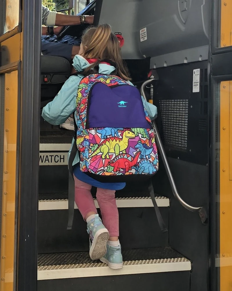 A child wearing a Riff Ruck backpack.